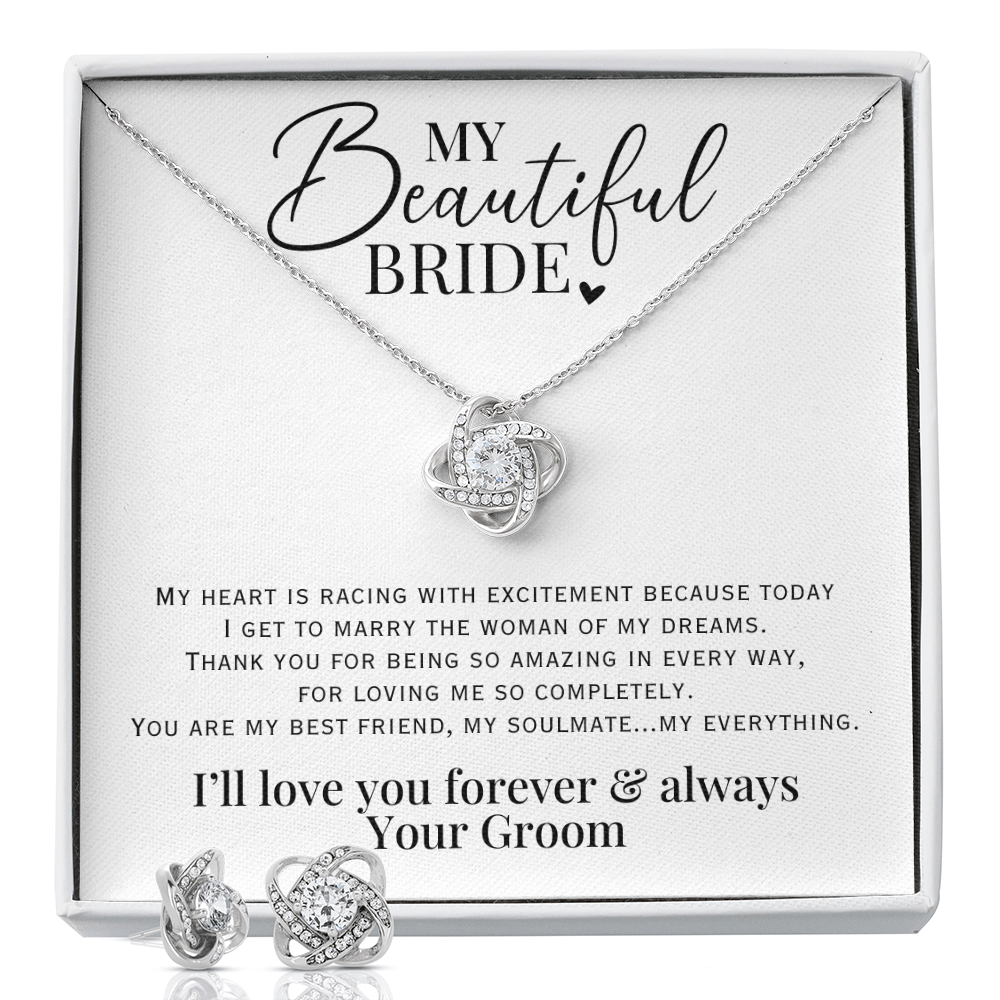 Beautiful wedding day gift for your bride, white gold love knot necklace & earring set with heartfelt message from groom.