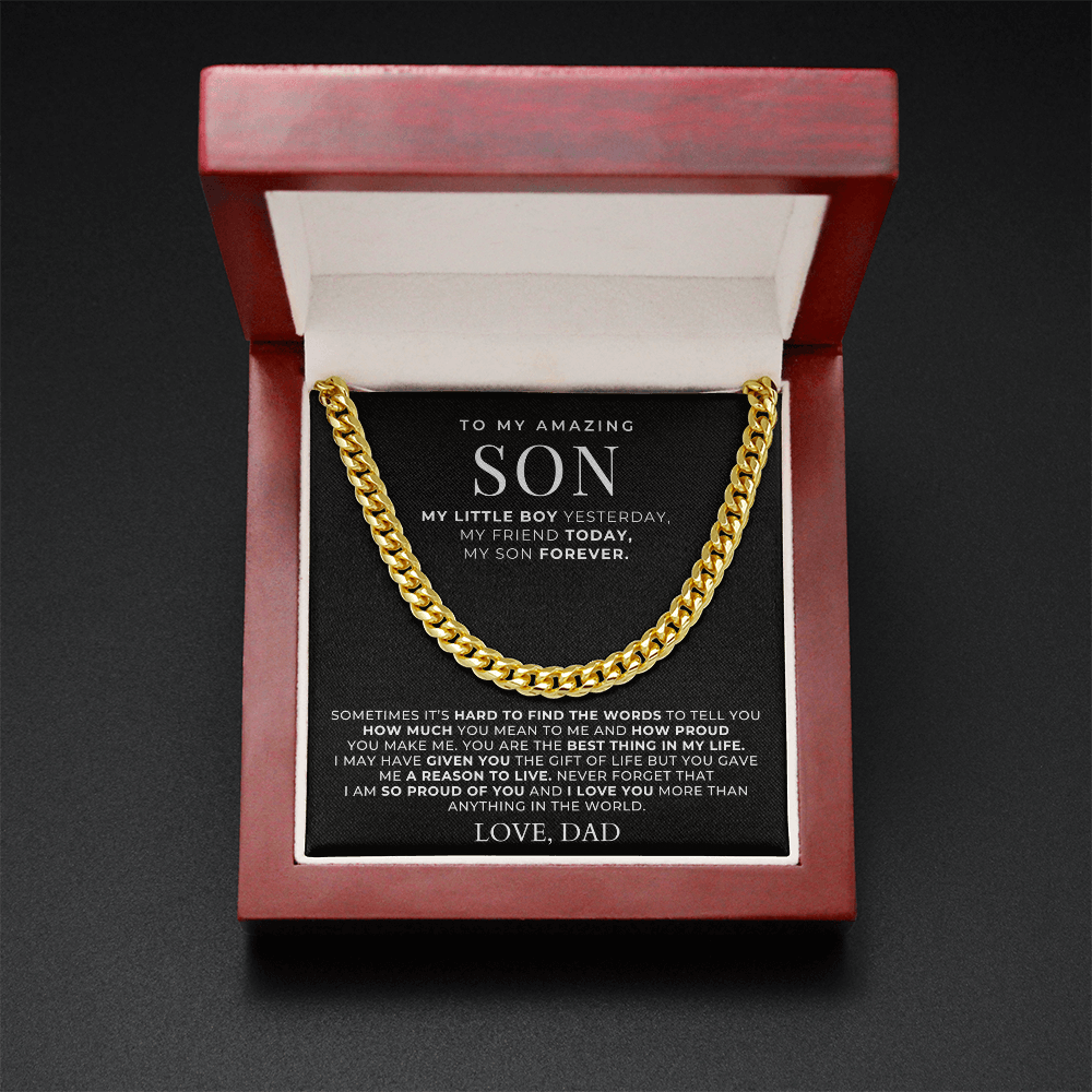 gold chain necklace with a message card inside a light up gift box. 