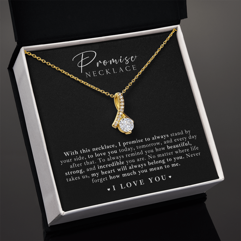 Romantic promise necklace for her, featuring a timeless gold ribbon design and a shimmering stone, perfect for any anniversary or Valentine’s Day gift.