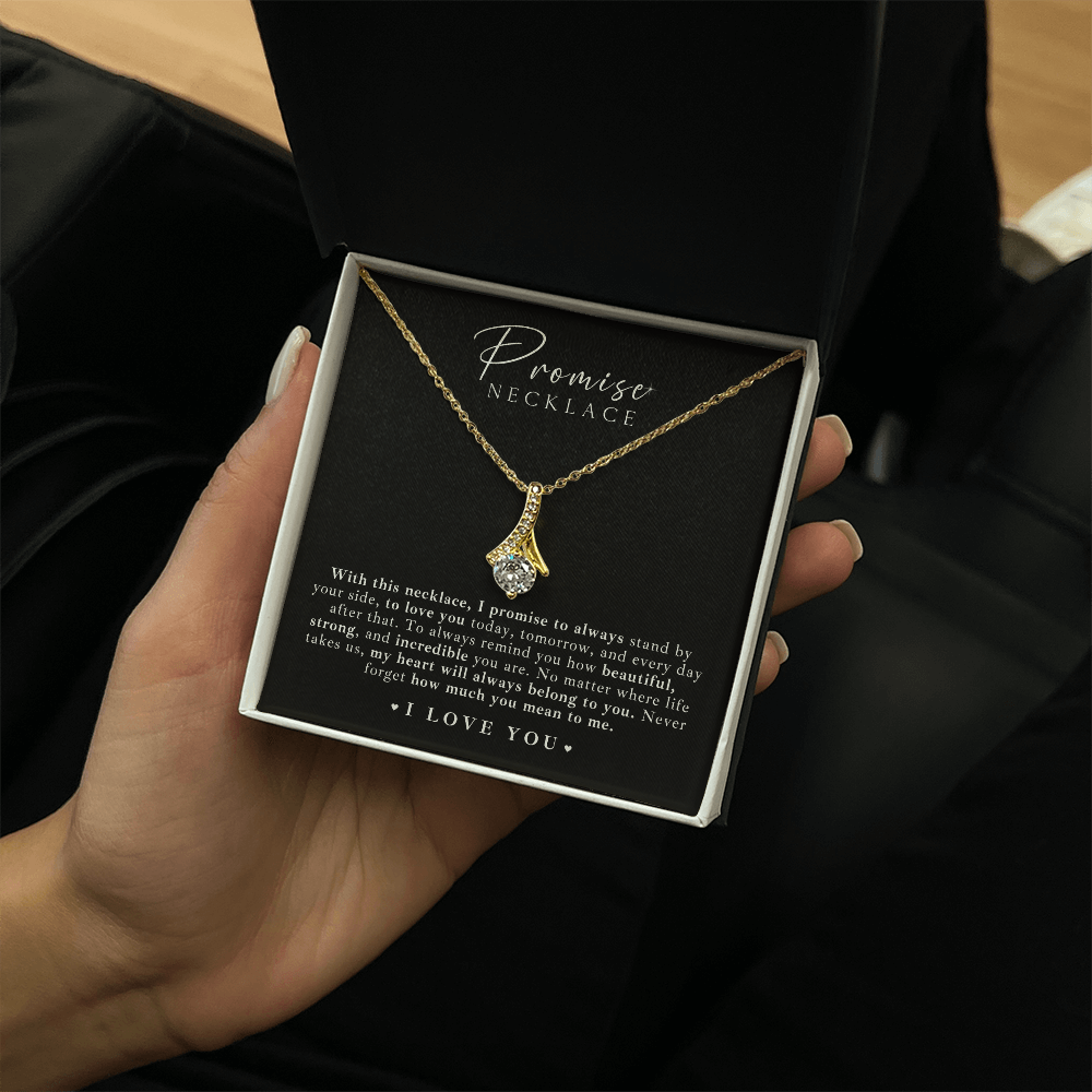 Romantic gold promise necklace for her, featuring a timeless ribbon design and a shimmering stone, perfect for any anniversary or Valentine’s Day gift.