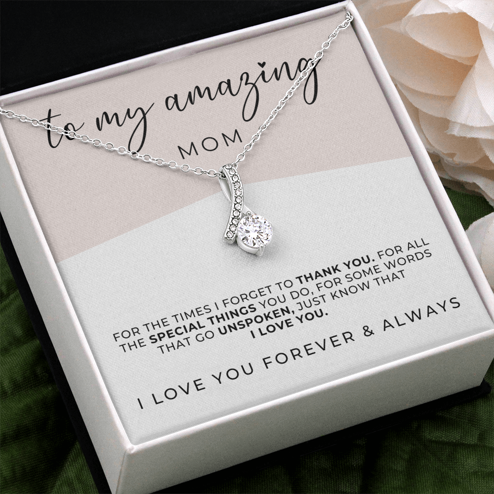 a meaningful mothers day or birthday gift for mom, white gold necklace with a message card.