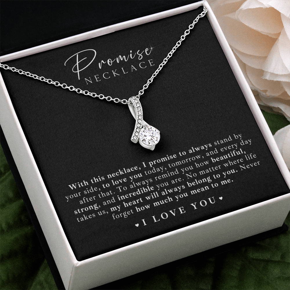 Romantic promise necklace for her, featuring a timeless ribbon design and a shimmering stone, perfect for any anniversary or Valentine’s Day gift.