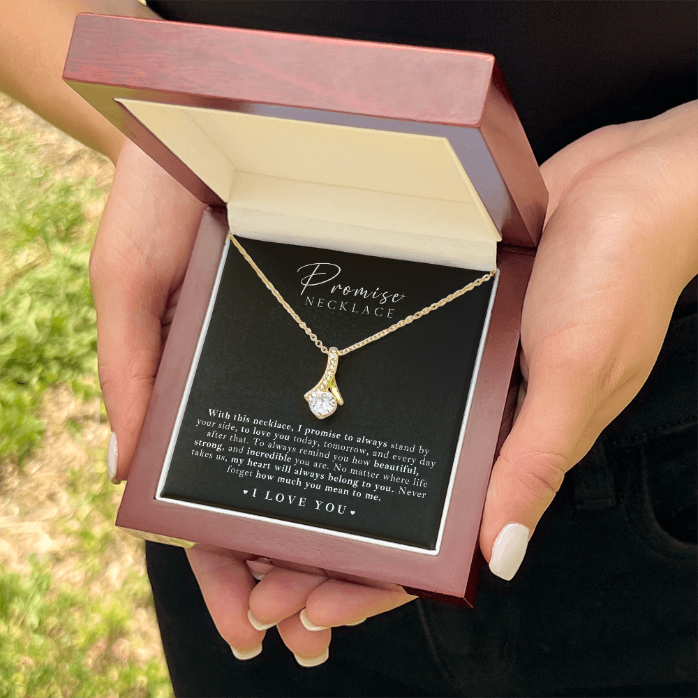 stunning promise necklace for girlfriend, featuring a timeless ribbon design and a shimmering stone, perfect for any anniversary or Valentine’s Day gift.