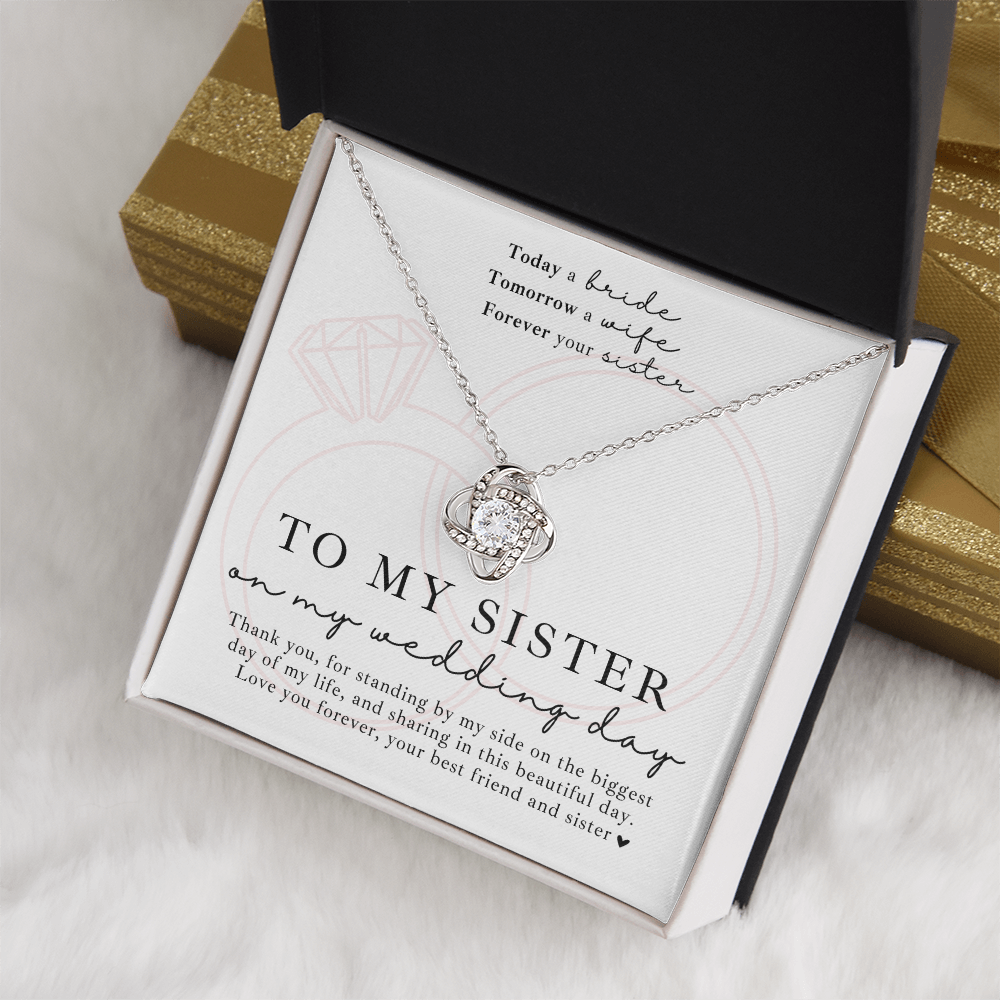 silver Love knot necklace gift for sister on wedding day with a heartfelt message card, perfect for showing appreciation and love.