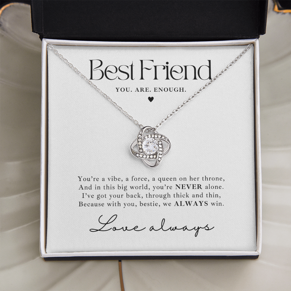 Silver Love Knot necklace gift for besties with empowering message card saying 'You are enough'. the jewelry makes a heartfelt gift for a best friend going through a tough time