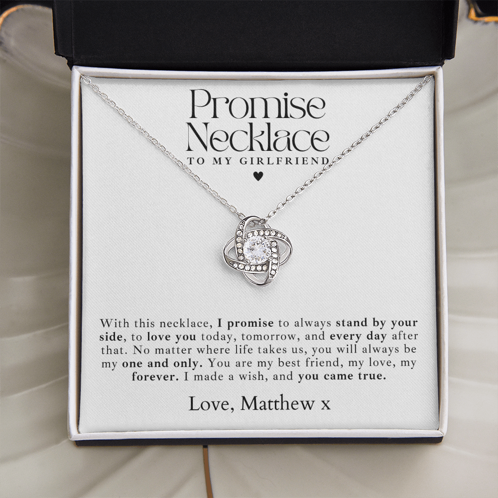 A beautiful silver promise necklace for girlfriend, featuring a delicate love knot pendant in a luxury gift box.