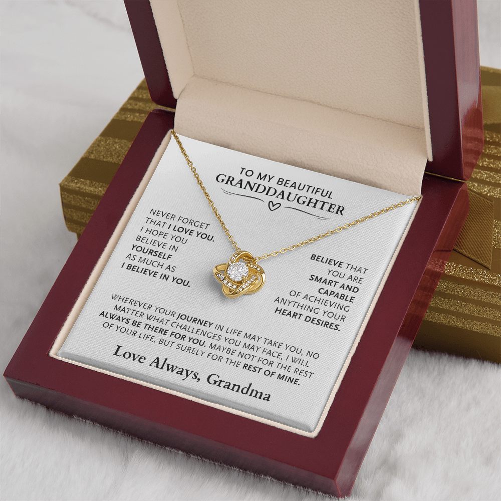 Gold love knot necklace gift to my beautiful granddaughter, with loving message card inside luxury gift box.