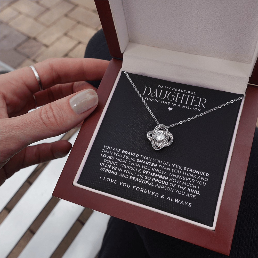 A special daughter necklace gift from mother or dad, with a message card inside the luxury lighted gift box