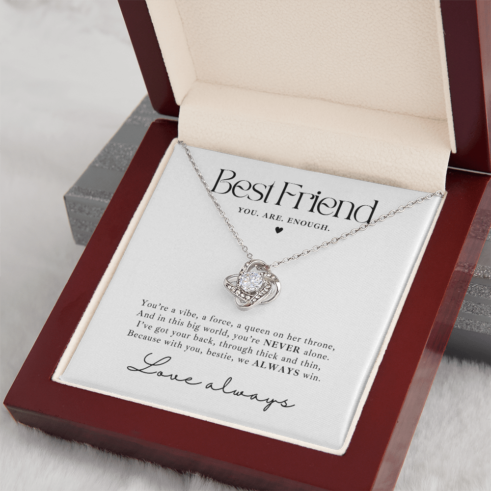 Silver Love Knot necklace gift for besties with empowering message card saying 'You are enough'. the jewelry makes a heartfelt gift for a best friend going through a tough time