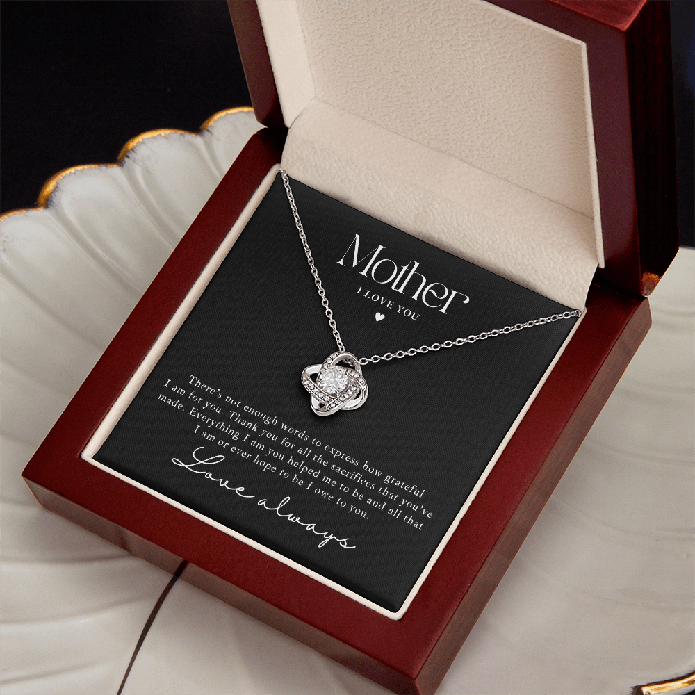 white gold necklace inside luxury gift box with a message card for mother from daughter or son