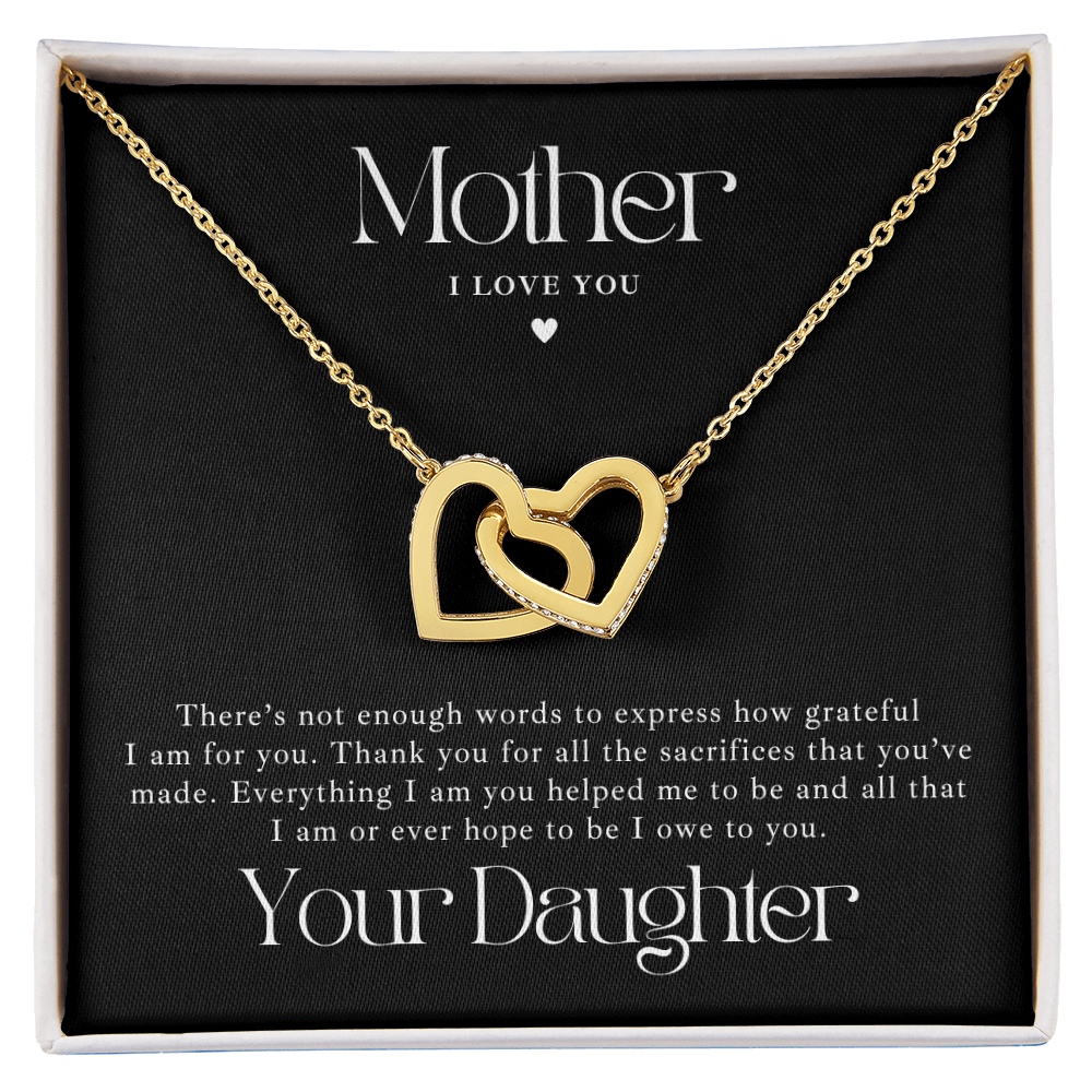 gold mother daughter necklace, interlocking hearts with a message card from daughter.